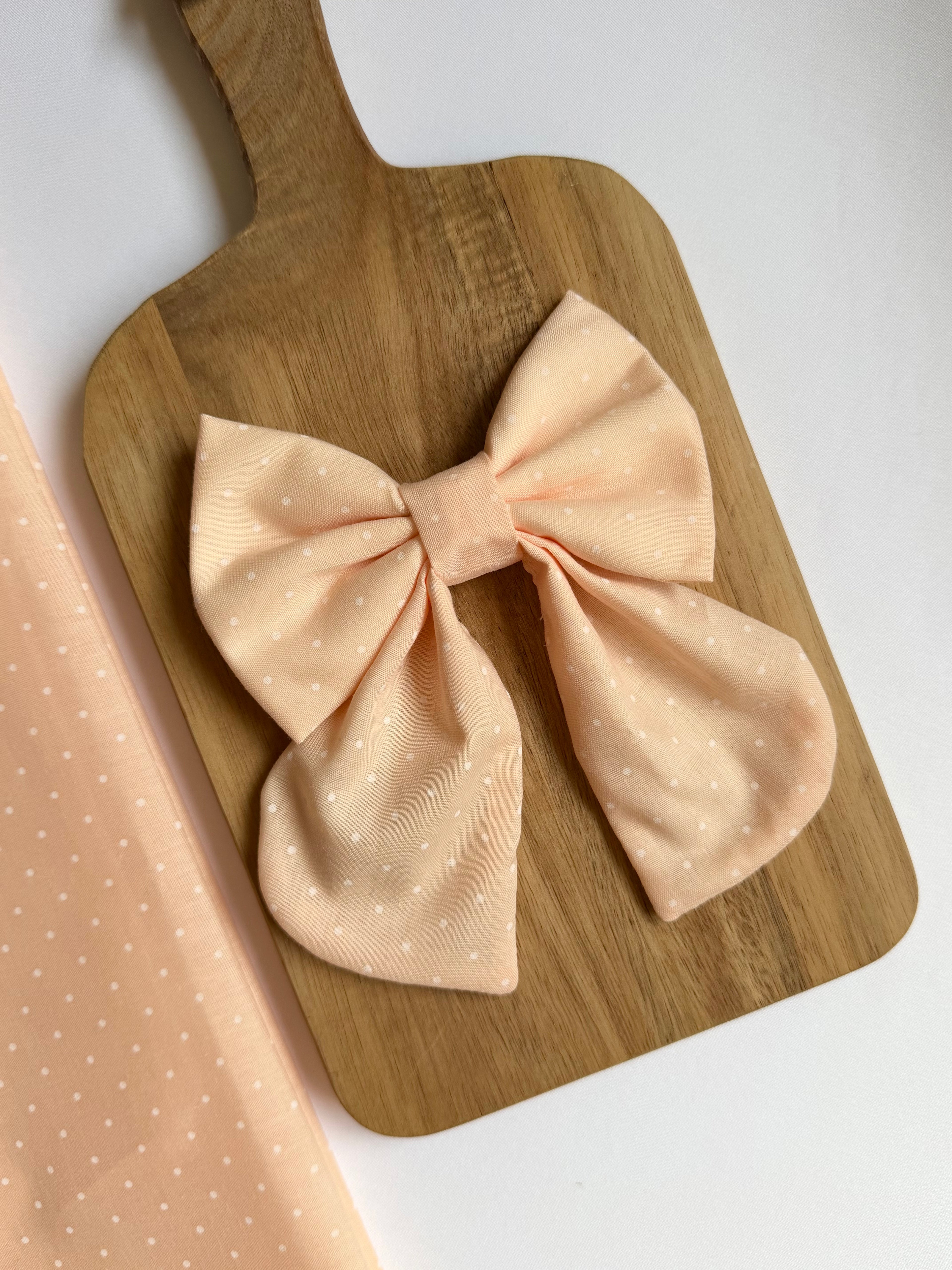 Peachy Polka Dot Sailor Dog Bow